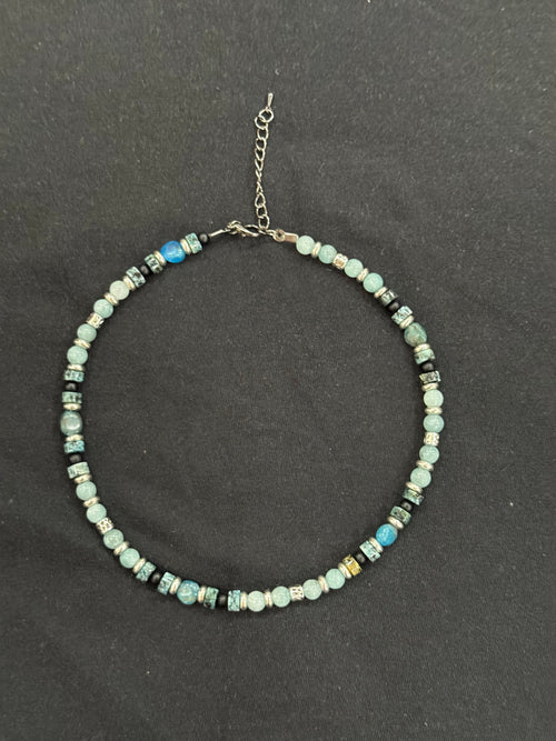 Full view of 15-inch aquamarine, turquoise, blue apatite and black onyx choker with silver accents