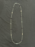 Full view of long silver-tone chain necklace with spaced aquamarine, amethyst and porcelain jasper stones