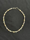 Full view of tourmaline and cultured pink pearl choker with imitation silver accents and stainless steel clasp