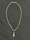 Full view of 15-inch aventurine and white pearl choker with copper spacers and turquoise pendant