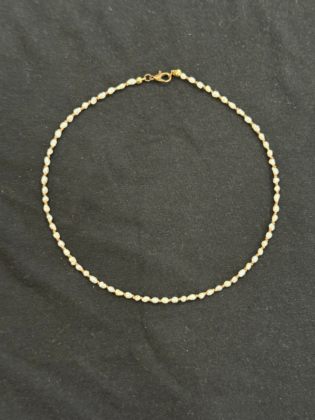 Full view of 2mm uncultured pearl and copper bead choker necklace