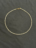 Full view of 2mm uncultured pearl and copper bead choker necklace