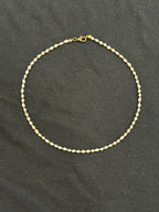 Full view of 2mm uncultured pearl and copper bead choker necklace