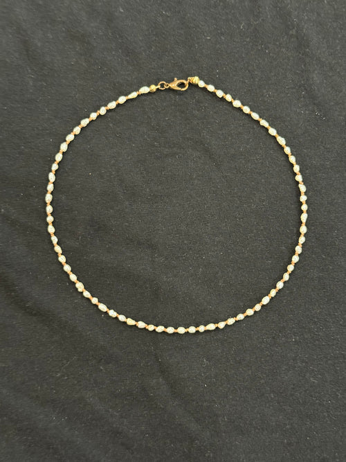 Full view of 2mm uncultured pearl and copper bead choker necklace