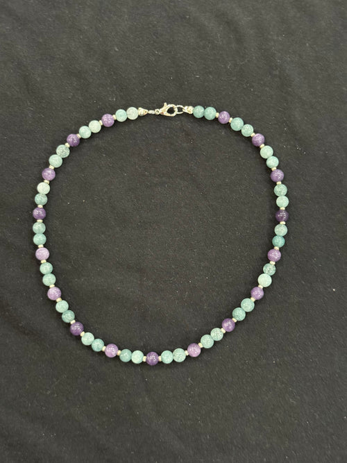 Full view of aquamarine and purple chalcedony necklace with silver accents