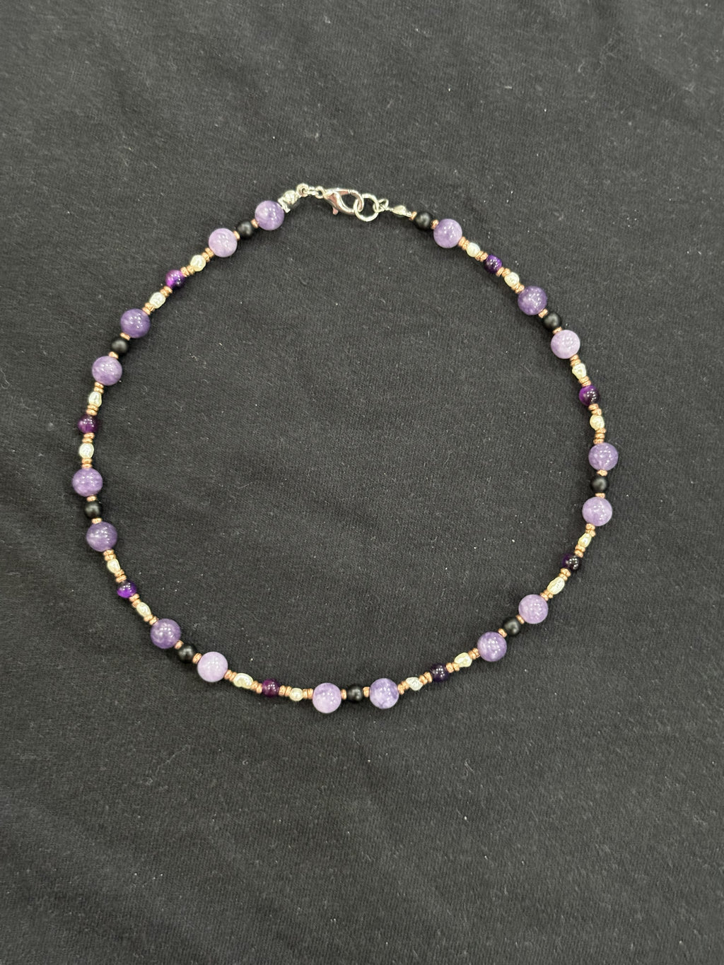 Full view of lavender chalcedony and onyx choker with white pearls and copper accents