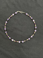 Full view of lavender chalcedony and onyx choker with white pearls and copper accents