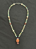 Full view of amazonite necklace with porcelain jasper and mookaite accents and a gemstone pendant