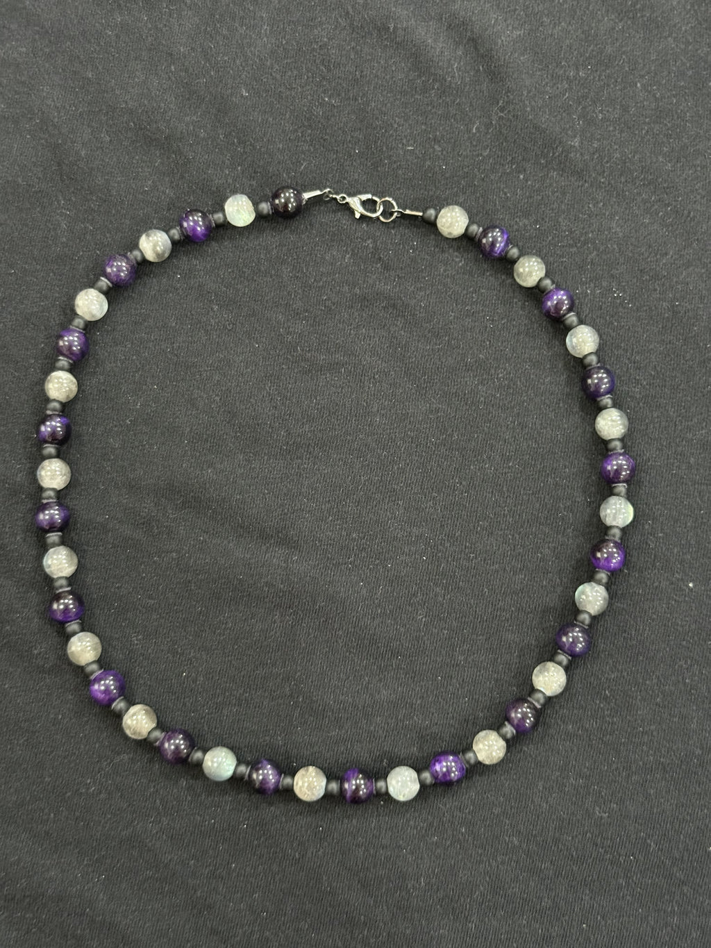 Full view of lepidolite and purple tiger’s eye necklace with black onyx accent beads