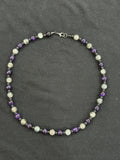 Full view of lepidolite and purple tiger’s eye necklace with black onyx accent beads