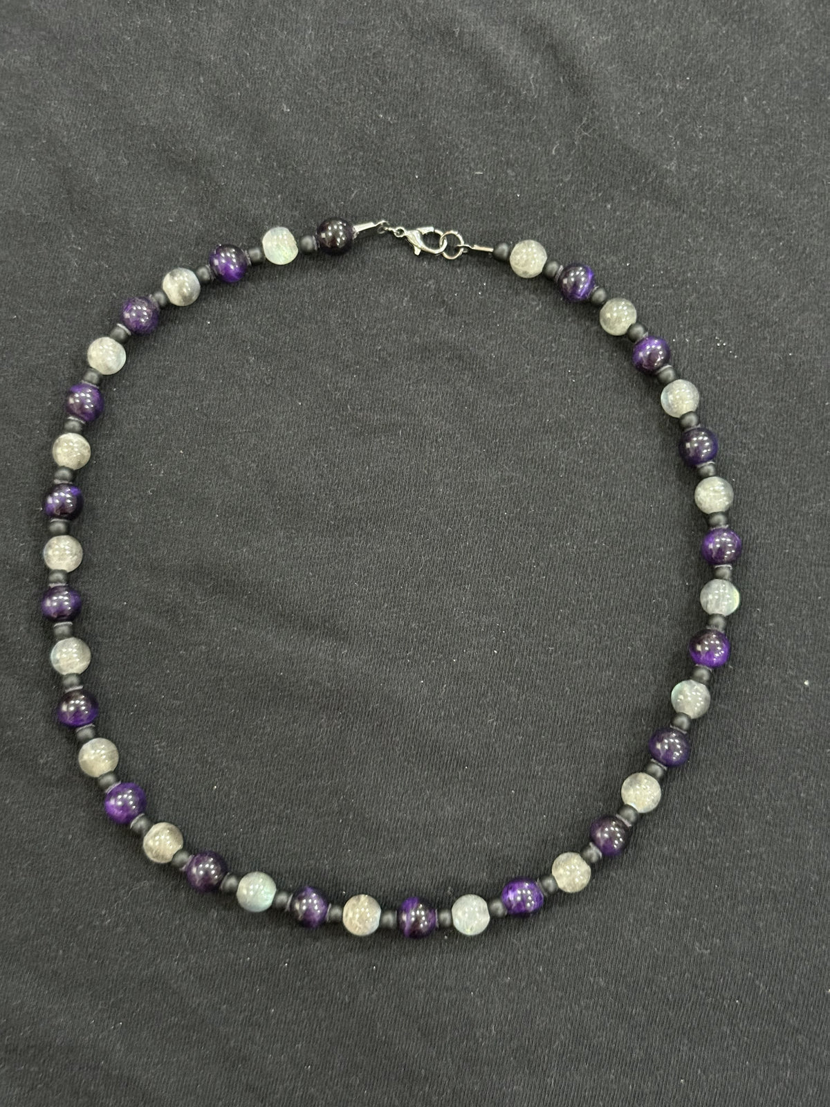 Full view of lepidolite and purple tiger’s eye necklace with black onyx accent beads