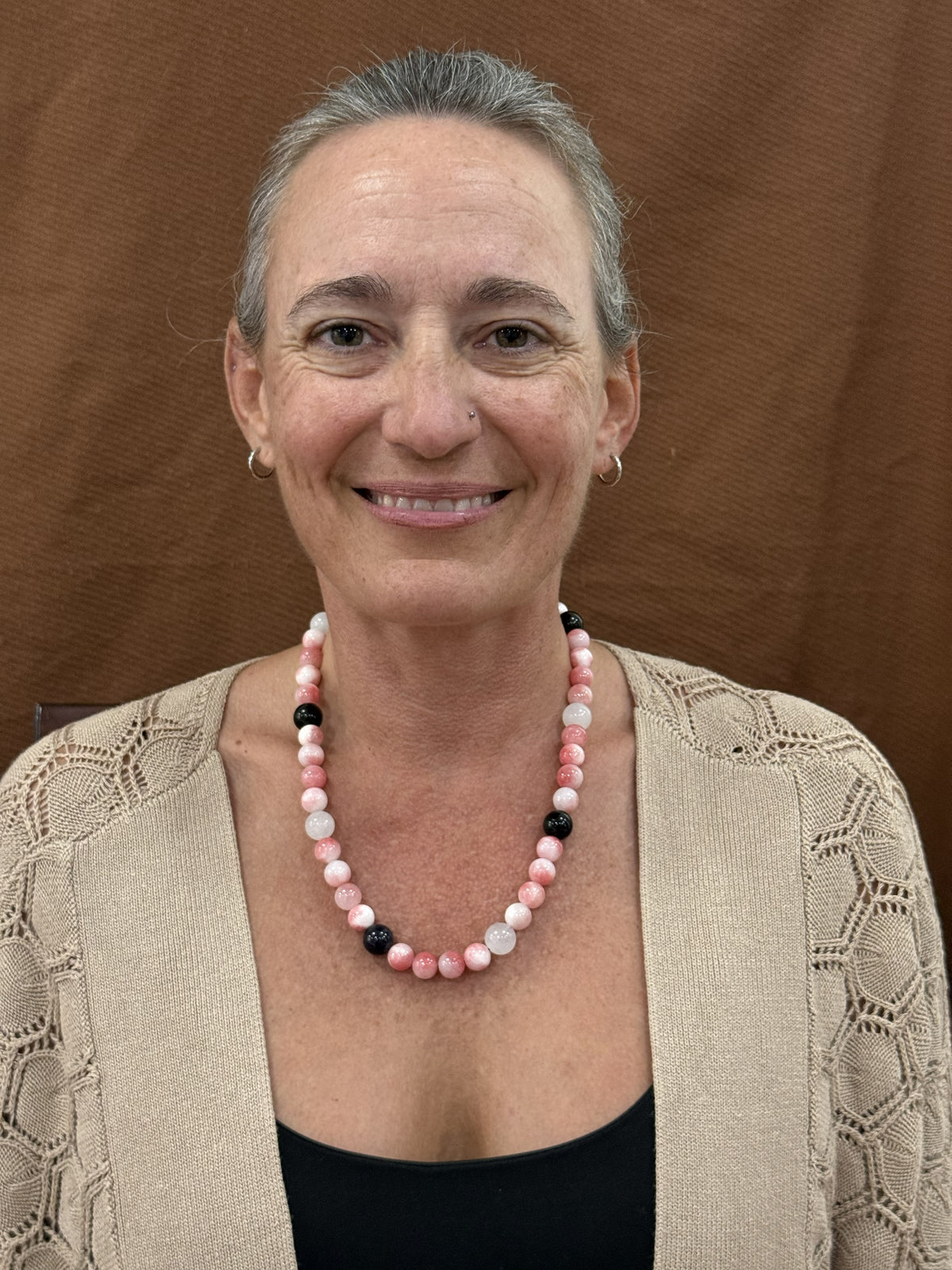 18-inch pink jade, white quartz and onyx necklace shown worn